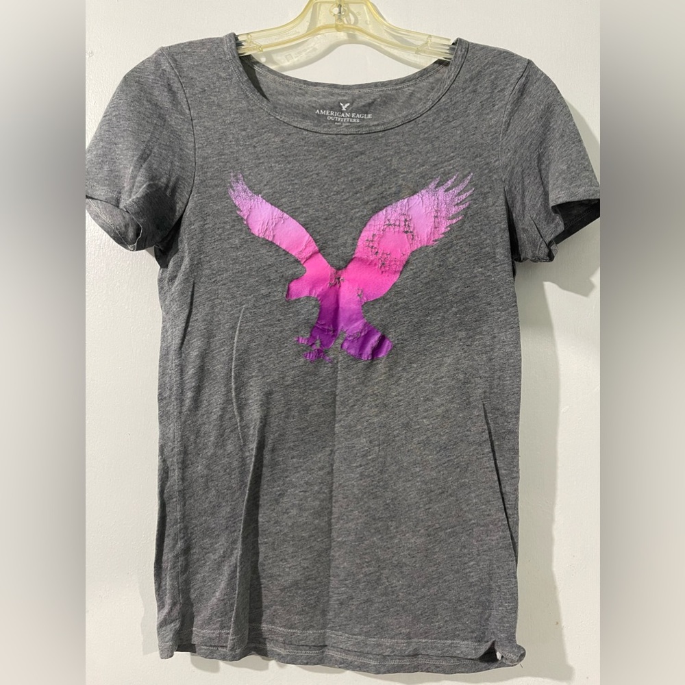 Grey American eagle shirt.